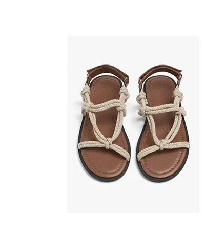 Flat sandals with cord straps