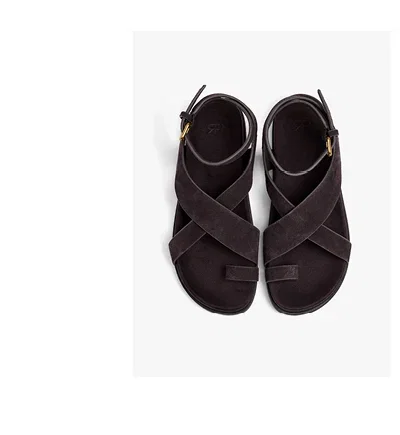 Flat leather sandals with crossed straps