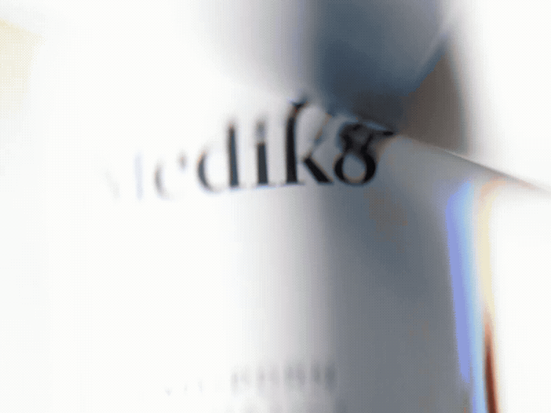 New Medik8 Exo-PDRN Prismatic+ Youthful Vitality Serum pump bottle.