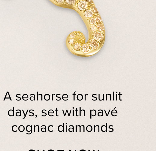 A seahorse for sunlit days, set with pave cognac diamonds. Shop Now