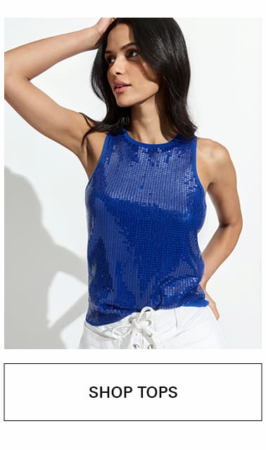A woman wearing a blue sequin top. shop tops