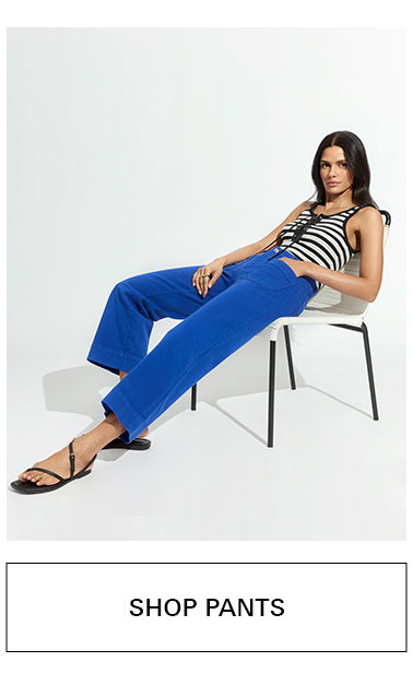 Woman wearing blue marine jean. shop pants.