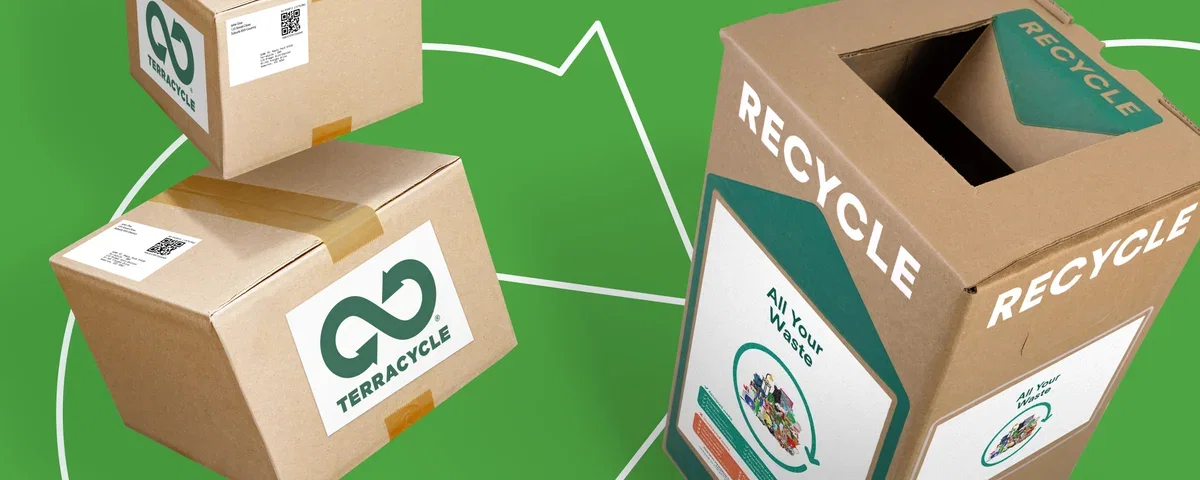 Recycling boxes on a green background