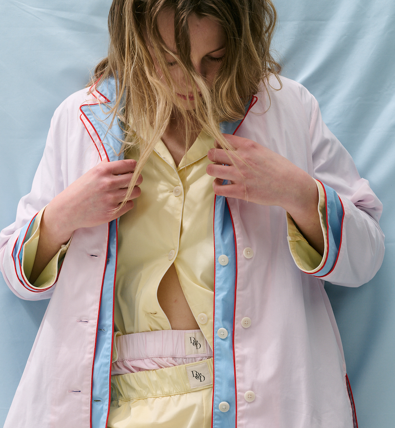 Image of a woman wearing multiple sets of the D&D 402 set