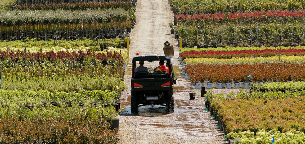 Polaris Pro XD Driving along a flower business' grounds