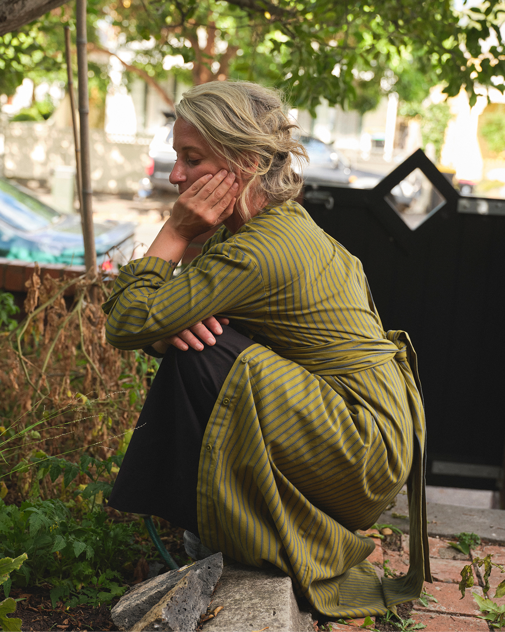 Sophie wears the Twist Dress and Surround Pant
