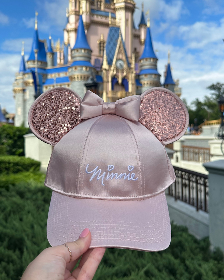 Women's Minnie Mouse Baseball Cap with 3D Bling Ears in front of the Disney castle