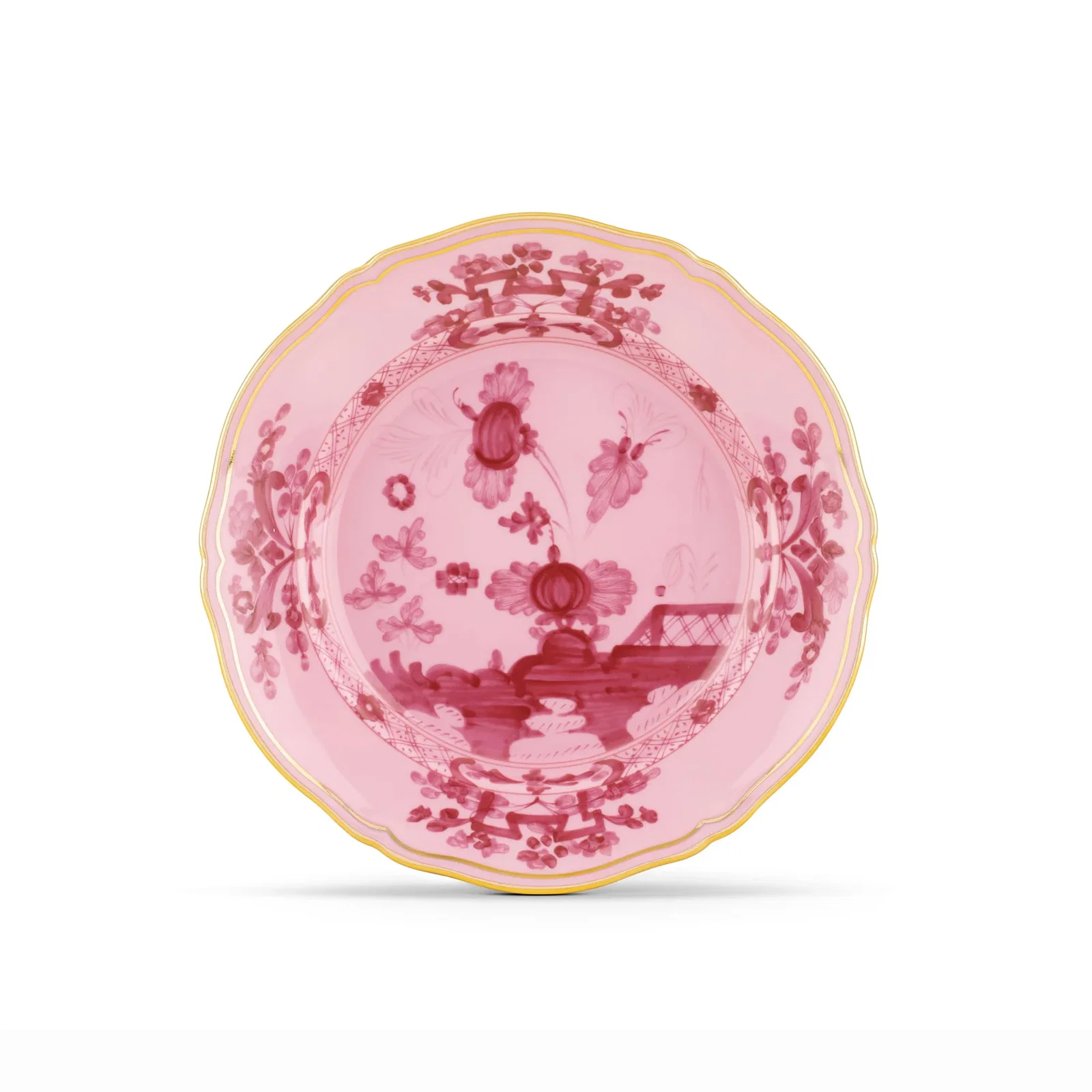 Pink porcelain decorative plate with red chinoiserie floral motif and scalloped gold rim