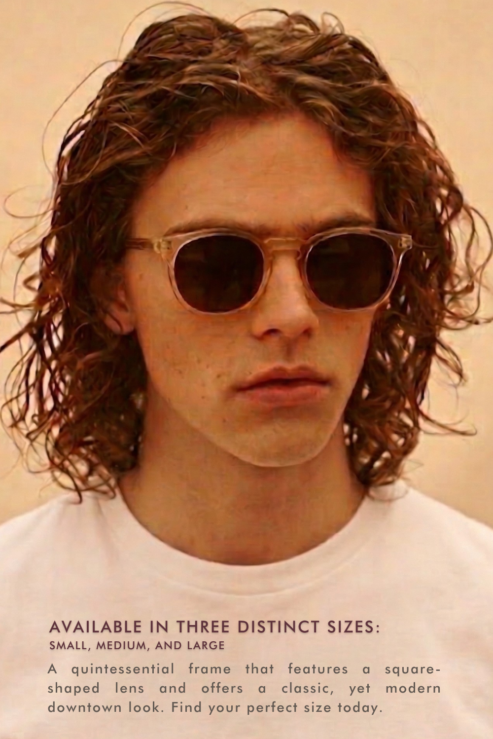 A portrait of a man with long, curly light-brown hair wearing the Eldridge sunglasses in a translucent champagne frame with dark lenses. Text at the bottom notes the frame is 