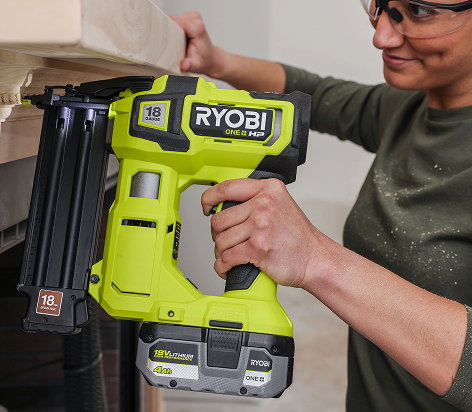 RYOBI nailer being used to attach trim 