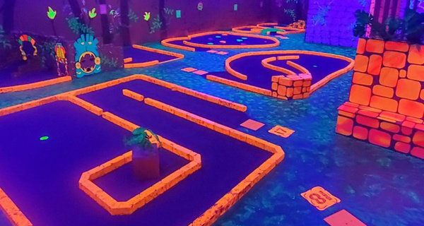 One Round of Blacklight Minigolf with an Arcade Game Card
