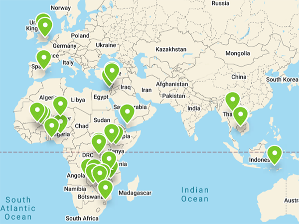 a section of the world map featuring green location pins across Africa, Europe, and Southeast Asia.