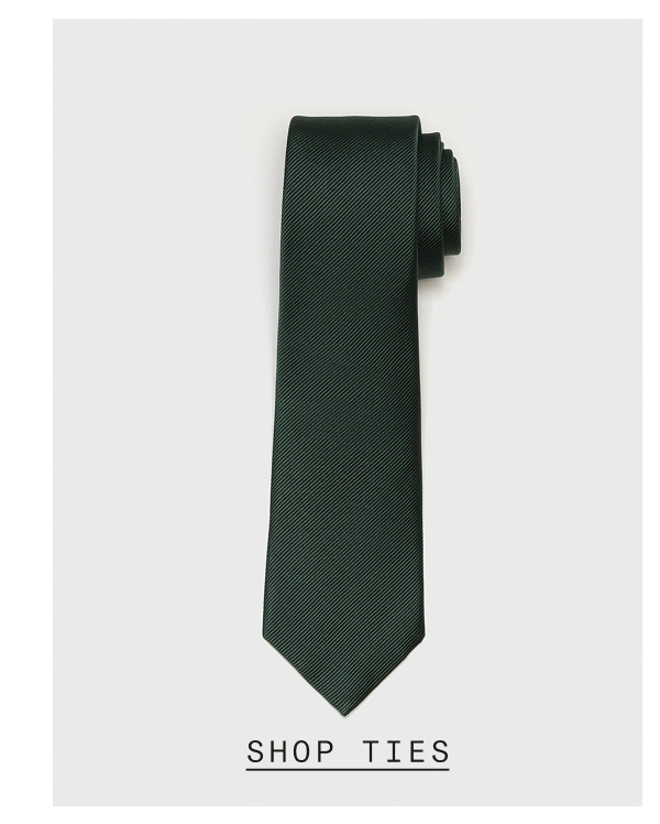 Dark forest green solid woven necktie displayed against a light gray background. SHOP TIES