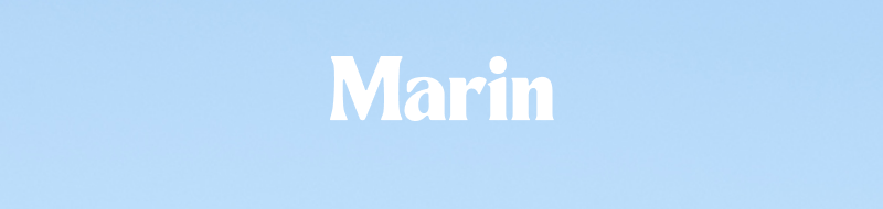 White Marin logo centered on a soft blue gradient background.