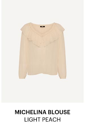 An image of a light peach colored silk blouse - Shop the Michelina Blouse in Light Peach.