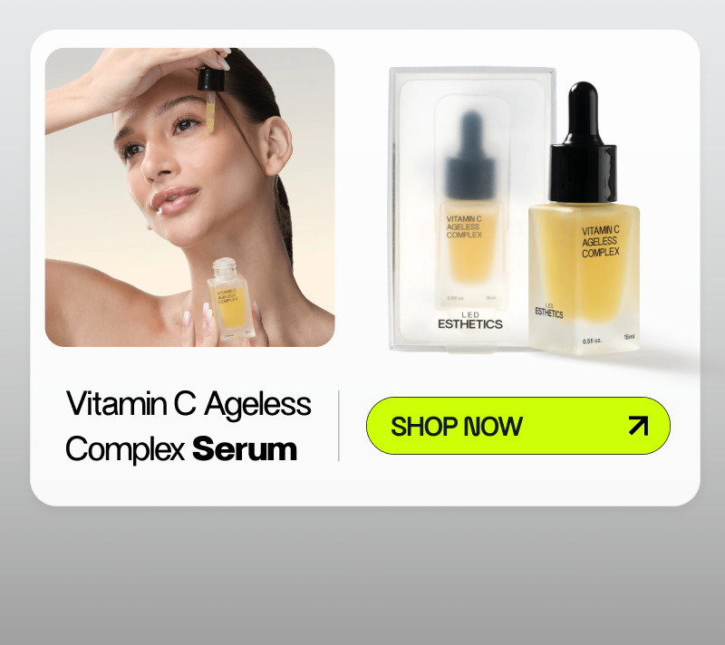 women applying serum on her face