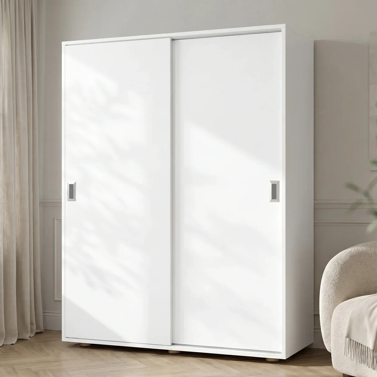 The Torvek Wardrobe in Cool White — bright neutral bedroom