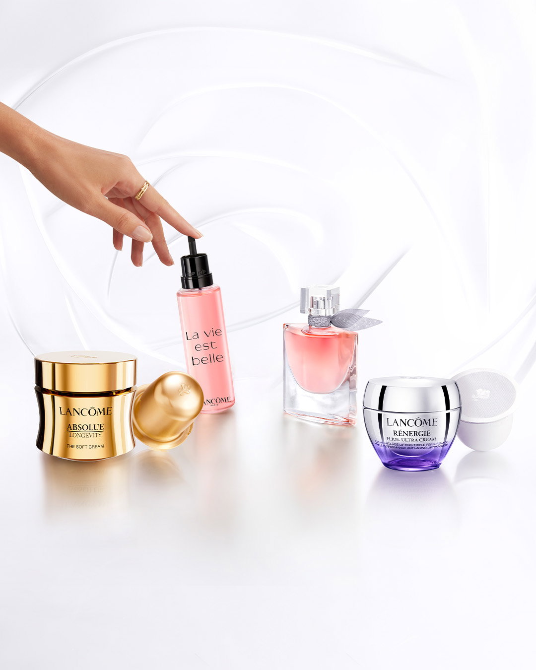Selezione Lancôme: Absolue Longevity Soft Cream, La vie est belle e Rénergie H.P.N. Ultra Cream su sfondo bianco