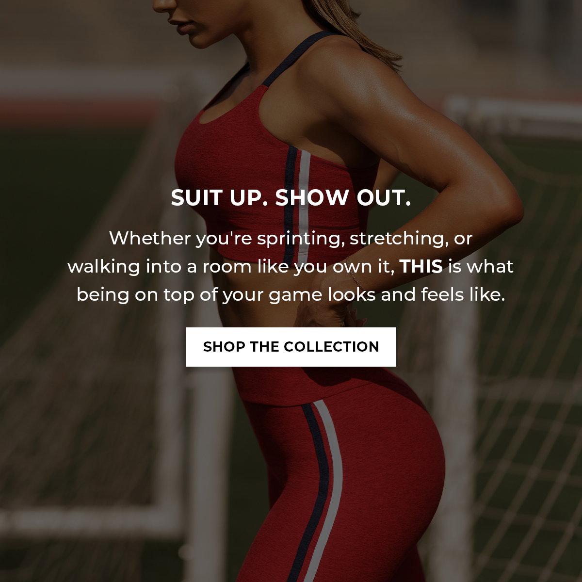 Model in Sunset Red Power Play set with “Suit Up. Show Out.” and Shop the Collection button