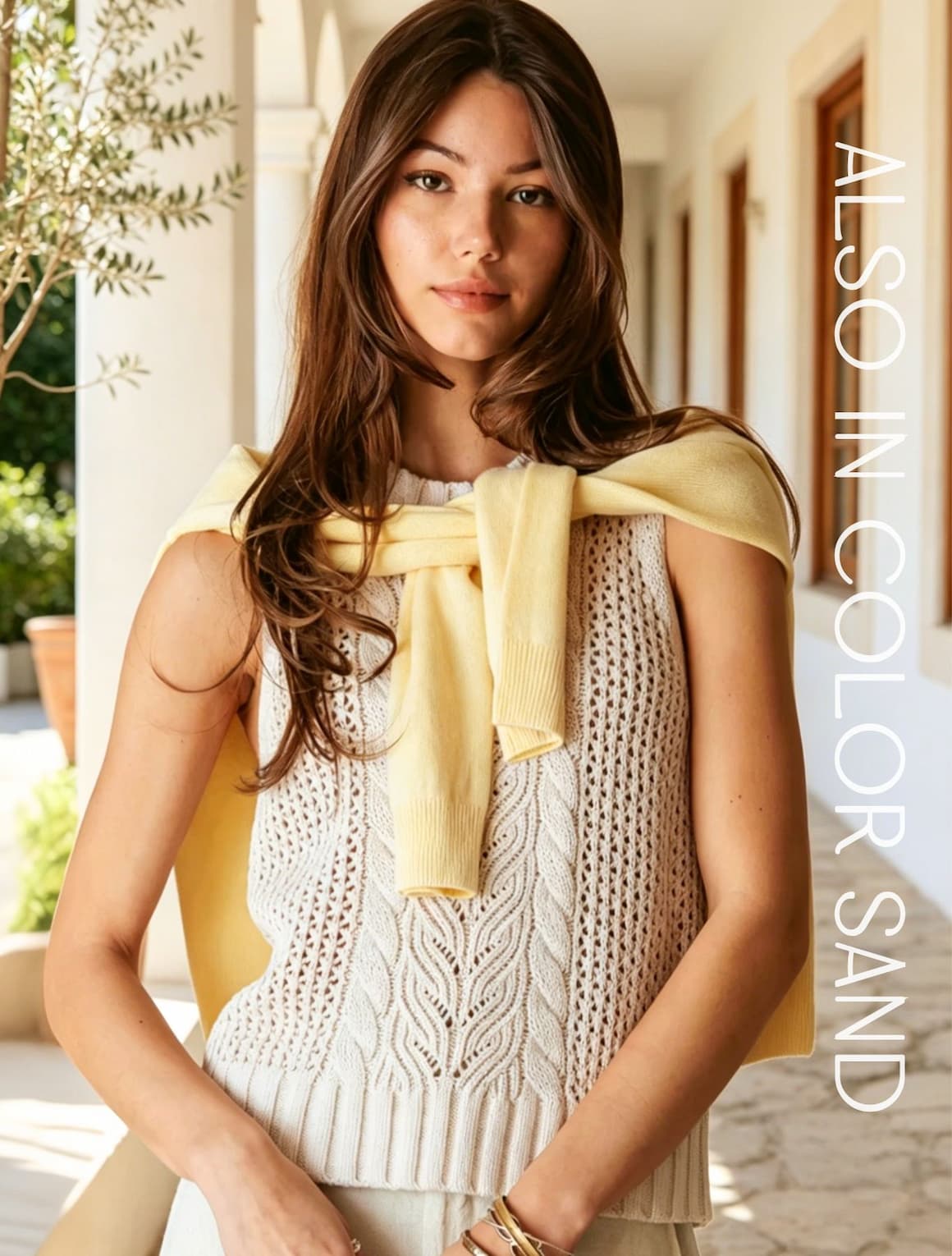 A lady wearing a sand linen blend texture knit tank