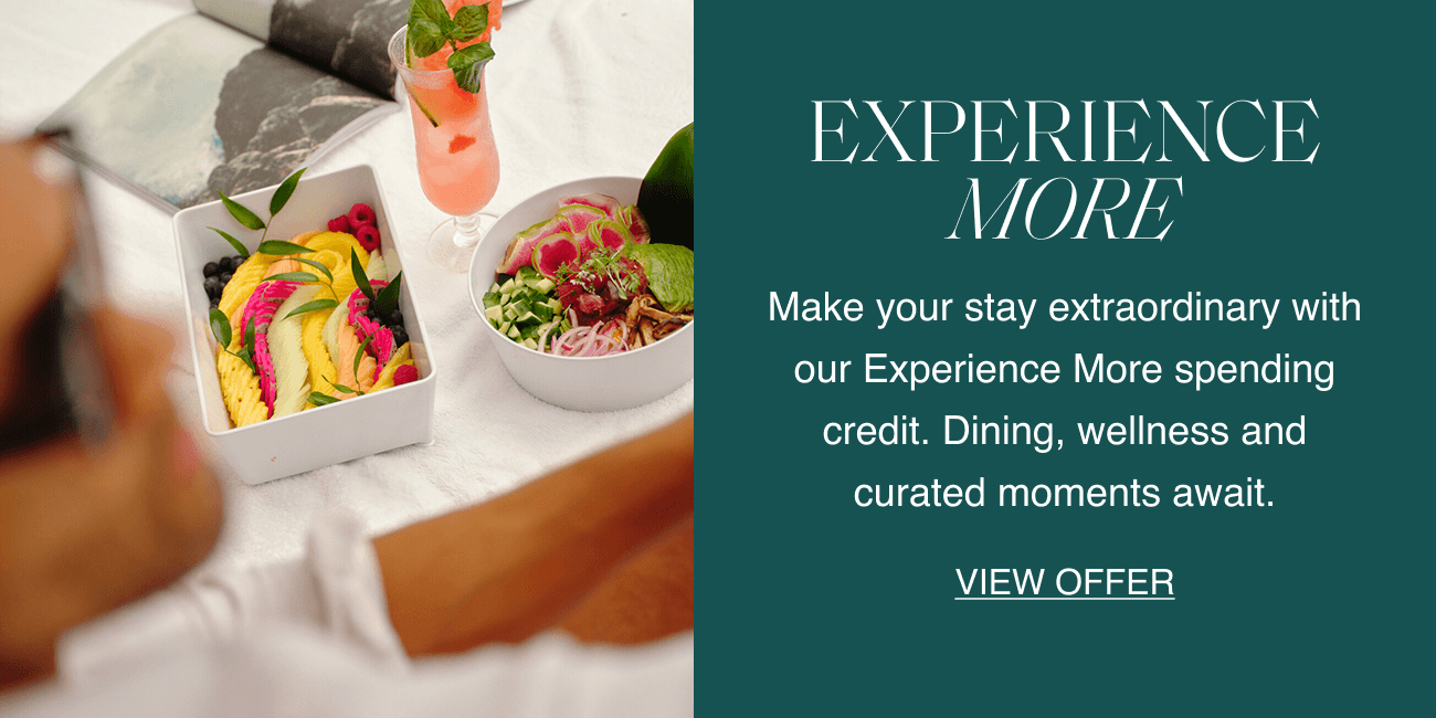 Colourful summer meal and a pink cocktail beside text: ‘Experience More. Make your stay extraordinary with our Experience More spending credit. Dining, wellness and curated moments await. View offer.