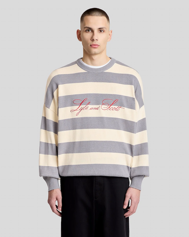 Model wears Striped Script Embroidered Knitted Jumper