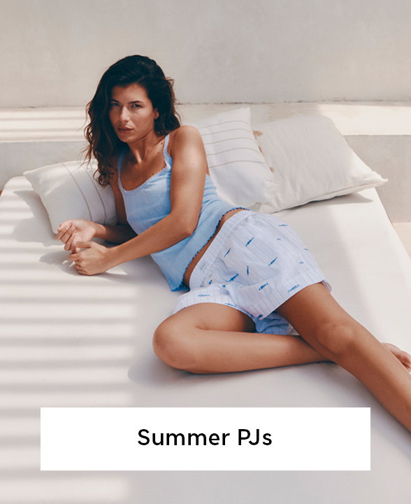 Woman wearing Blue Pure Cotton Pointelle Lace Cami Pyjama Top and White Mix Poplin Embroidered Sardines Pyjama Shorts