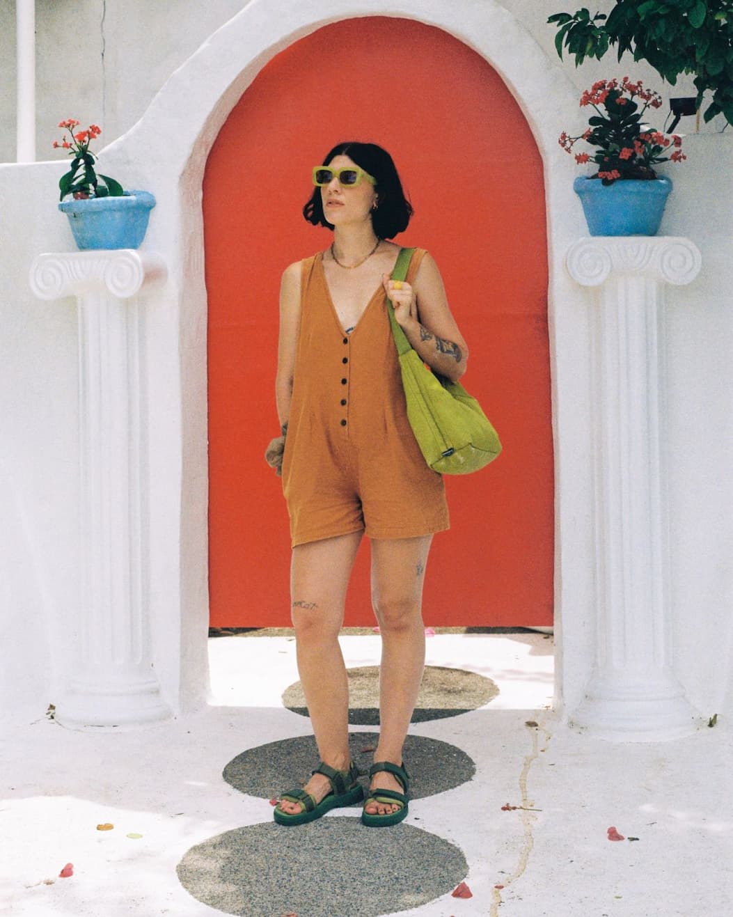@lucy_lumen wears Bright Olive Lochie Sandal