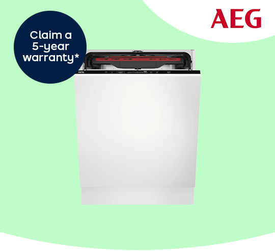 A white AEG dishwasher against a green background.