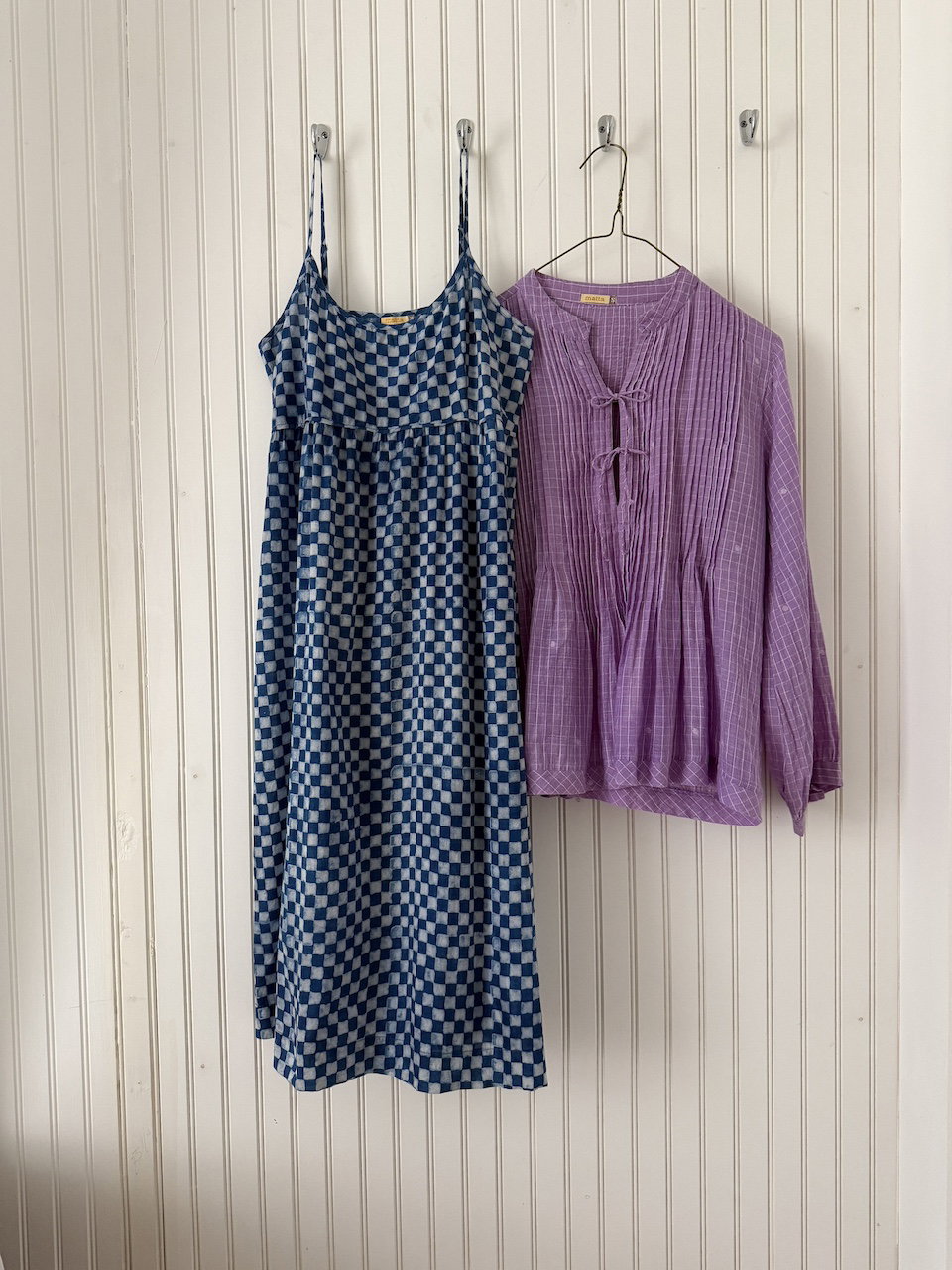 alt="indigo chckered slip dress and purple jamdani top""