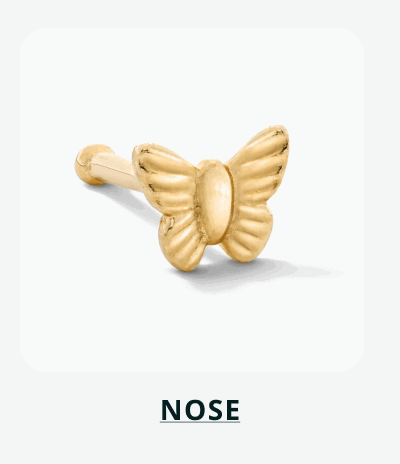 Gold nose stud with butterfly, featuring detailed textured wings. Click here to shop nose
