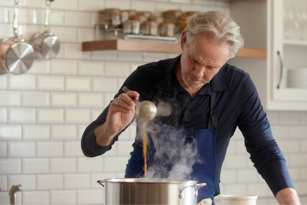 IMG: Chef Thomas Keller in the kitchen with Hestan cookware. Text that reads: "Michelin-star Chef Thomas Keller - The French Laundry"