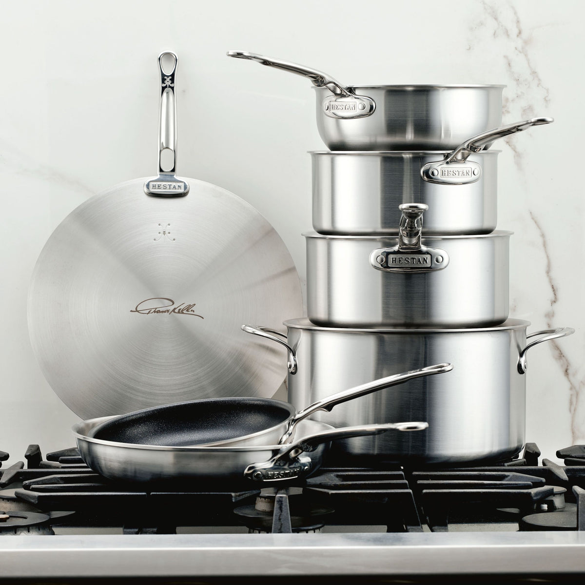 IMG: Stainless Steel 7-Piece Cookware Set on marble countertop
