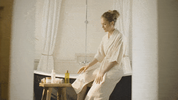 a video of a woman enjoying a bath