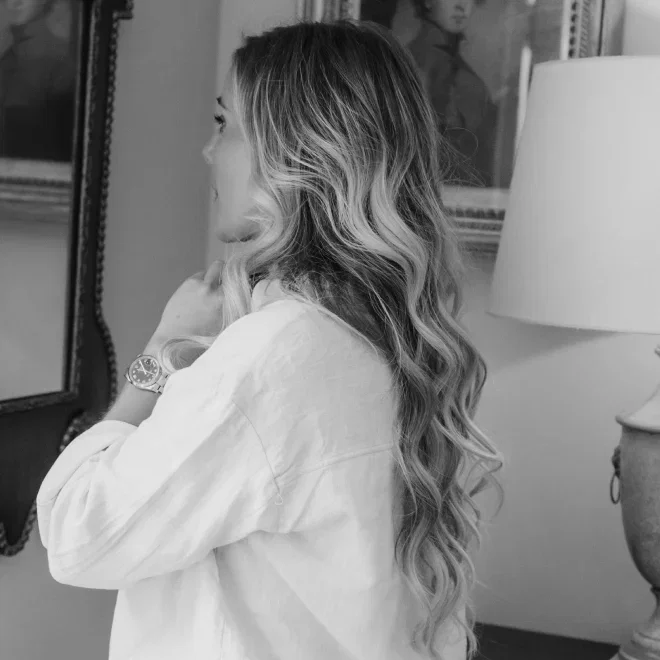 Wedding guest with hair styled with The Contouring Original Iron