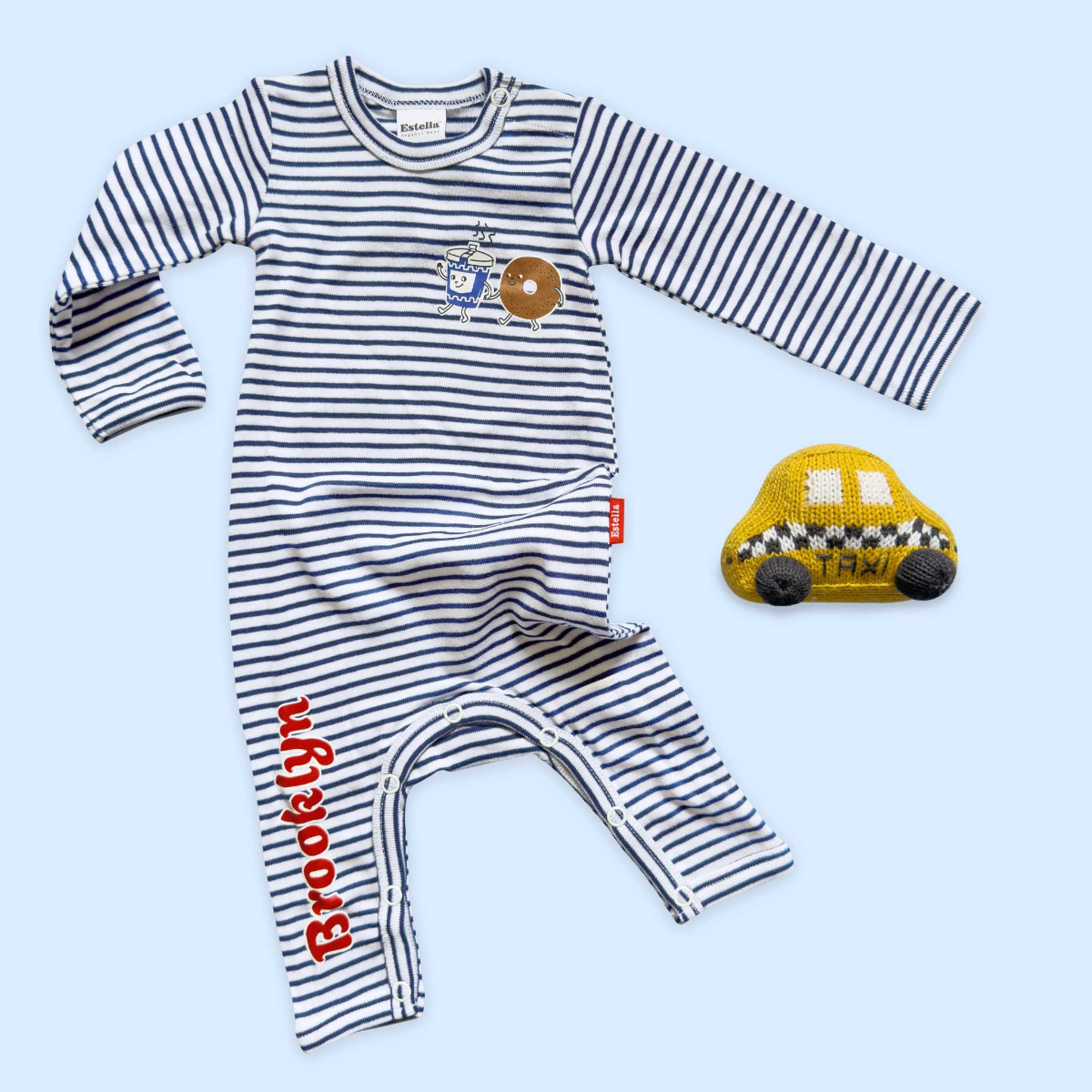 Brooklyn Brunch Romper & Rattle Set — organic romper paired with a hand-knit NYC rattle