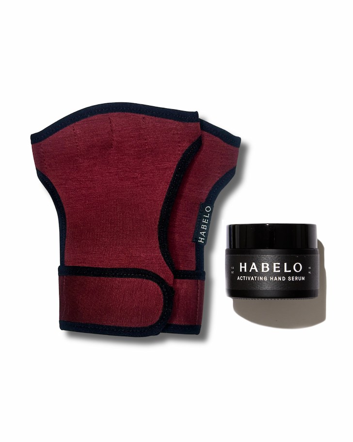 Habelo Bordeaux Treatment-Boosting Gloves paired with Activating Hand Serum.