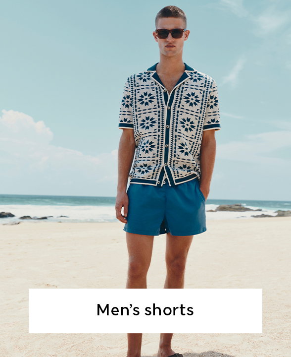 Man wearing Blue Mix Shirt and Marine Quick Dry Plain Swim Shorts