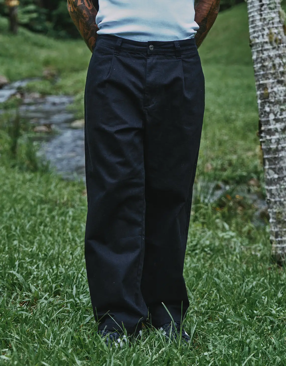 Baggy Fit Pleated Pants in Black.