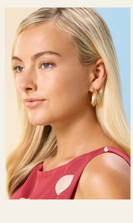 Shop Twisted Matte Gold Hoop Earrings