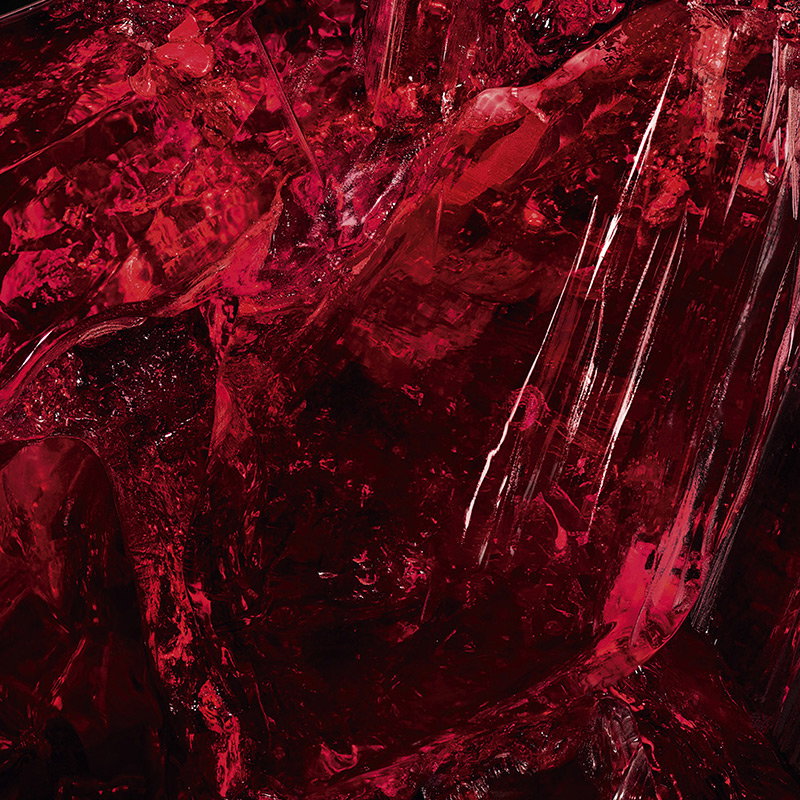 Macro shot of dark red crystalline textures.