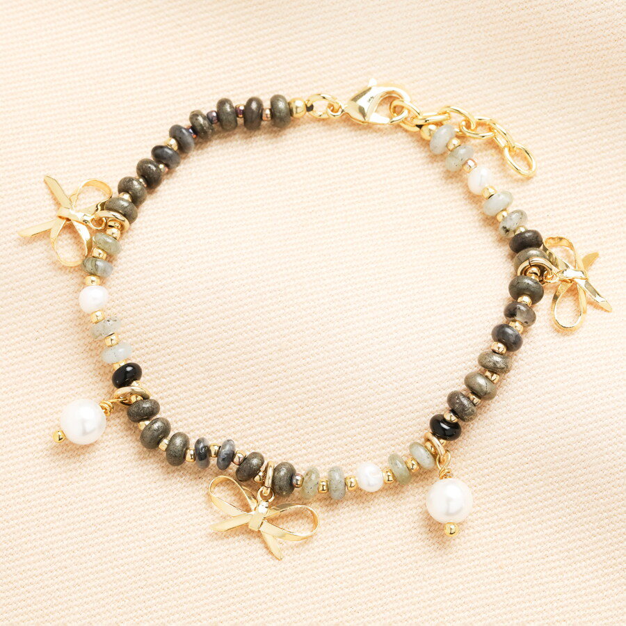 Image of Semi Precious Black Beaded Bow Charm Bracelet in Gold