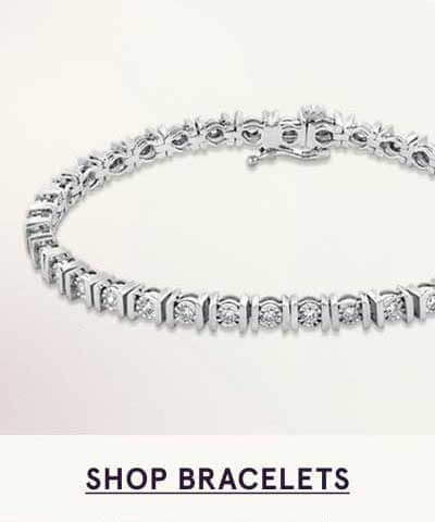 Silver bracelet made of square-shaped links encrusted with round diamonds. Click here to shop bracelets