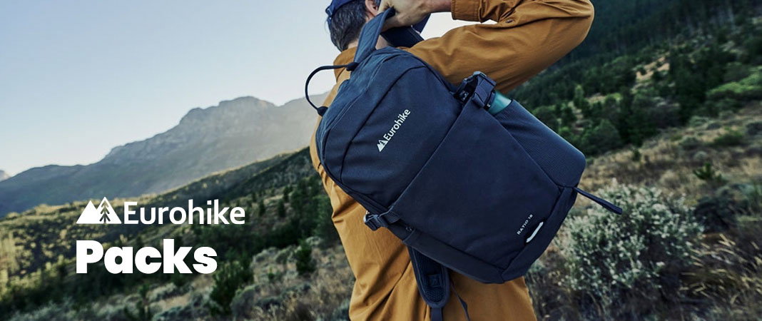 Man throws a Eurohike Ratio 18L backpack over this shoulder.