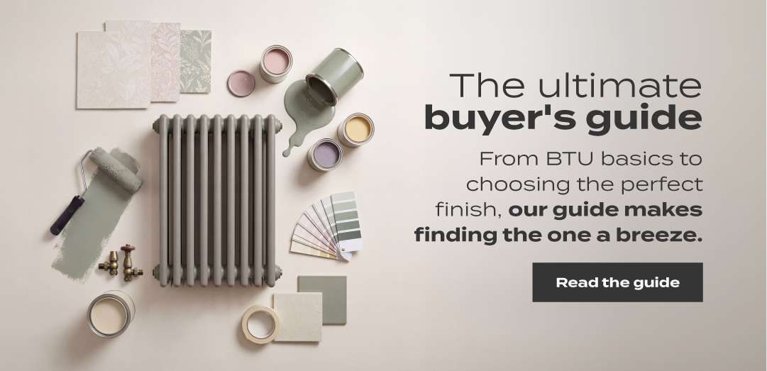 Flat lay of a compact grey radiator surrounded by paint tins, colour swatches, and decorating tools promoting a radiator buyer’s guide.