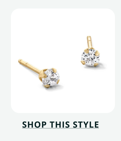 Gold set round diamond studs. Click here to shop this style