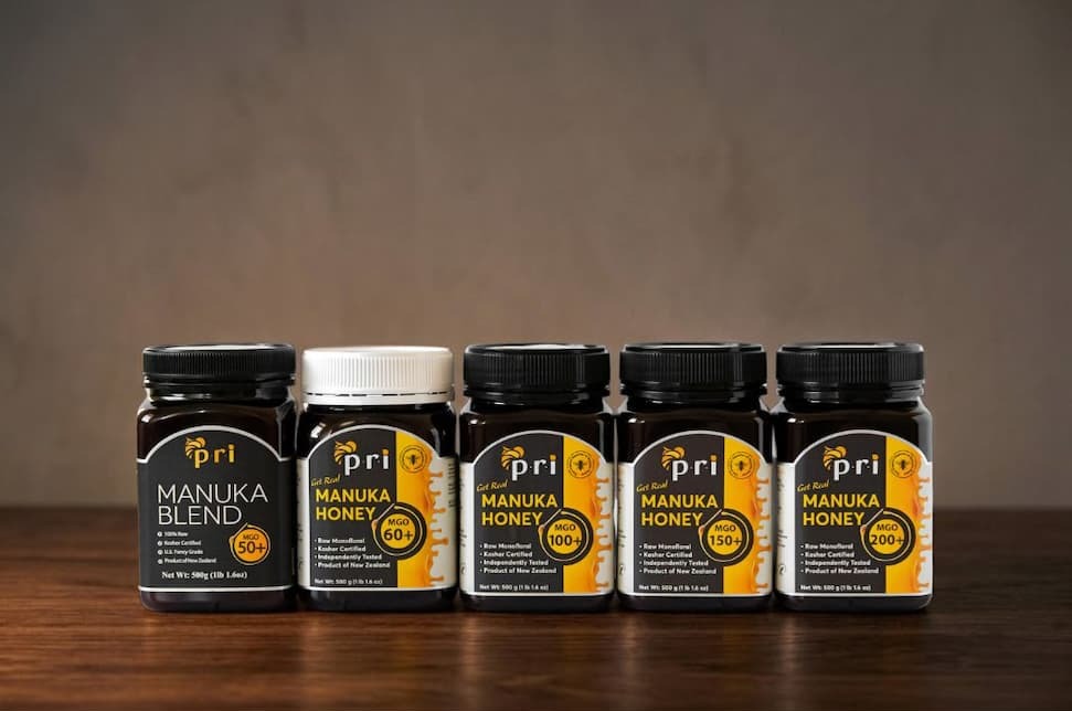 an image of a group of jars of honey sitting on a counter