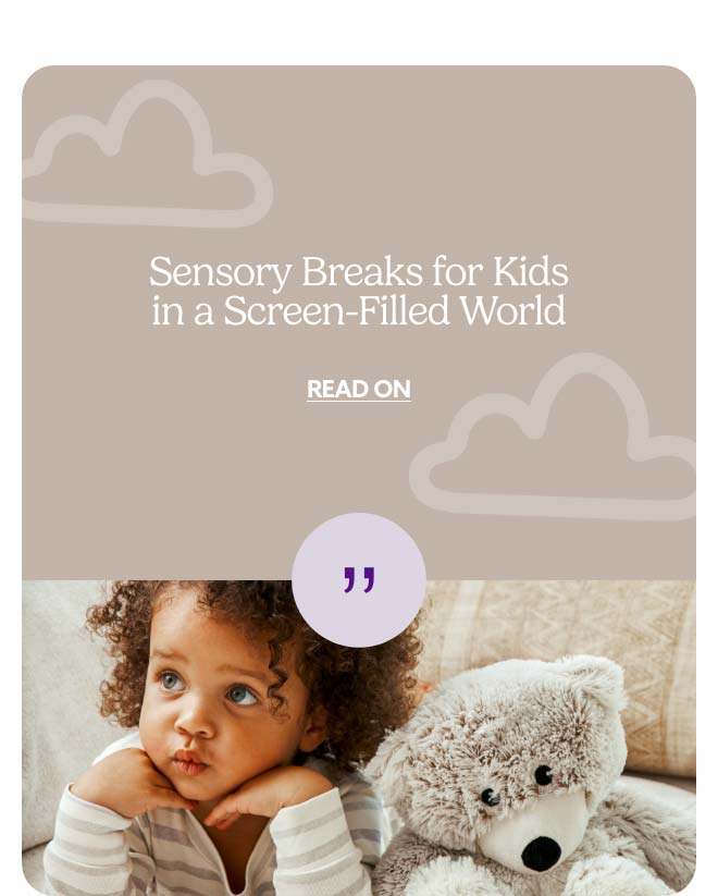 A child with Marshmallow Bear Warmies. Read on about sensory breaks for kids.