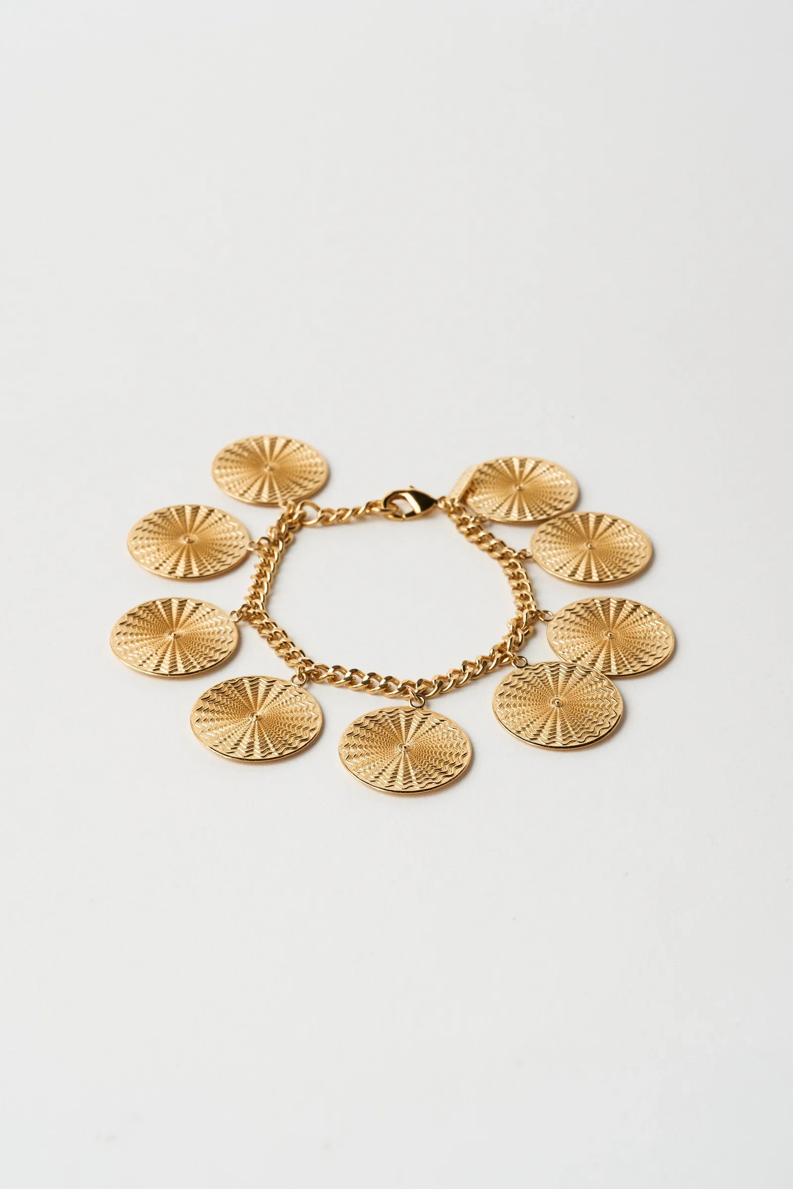 Image of The Chaos Sunburst Charm Bracelet in Gold