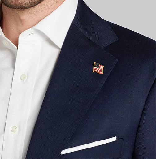 Featuring textured wool blend with stretch, a softer shoulder, and lightweight construction. Signature details like antique brass eagle crest buttons and bespoke interior labeling bring craftmanship to every wear. | Shop Now